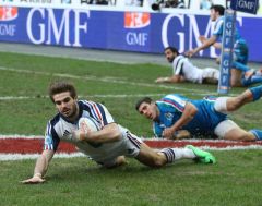 Hugo Bonneval plunges over the line for France's third try in their 30-10 win over Italy at the Stade de France